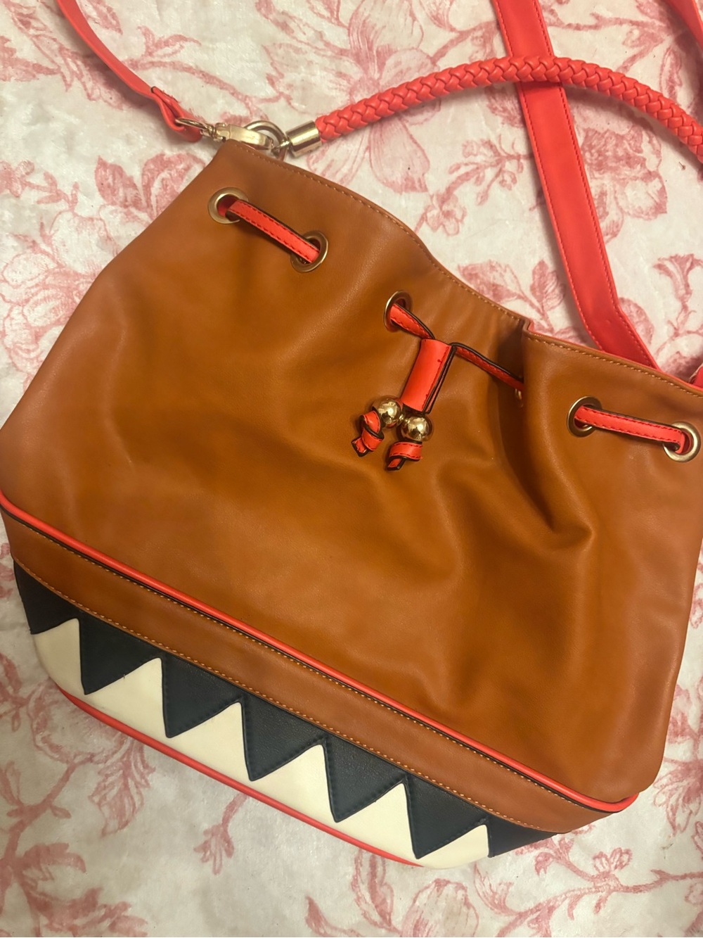 Aldo Tan and Coral Drawstring Shoulder Bag with Chevron Accent